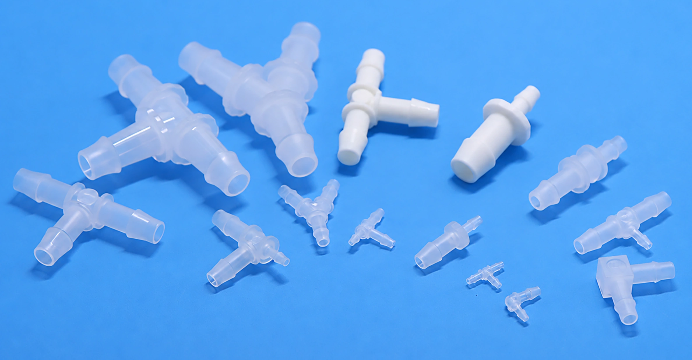 FOREACH straight, elbow, tee and wye barbed fittings in different sizes on a blue background